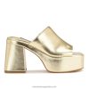 platino mules danzi con plataforma Nine West 0DDT0674